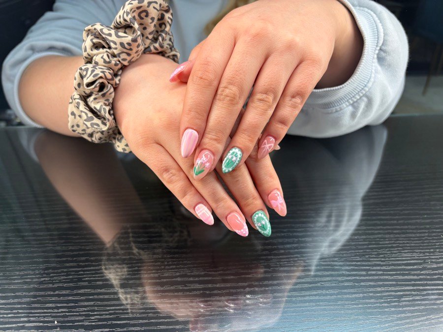 Pink nails with mint and floral accents